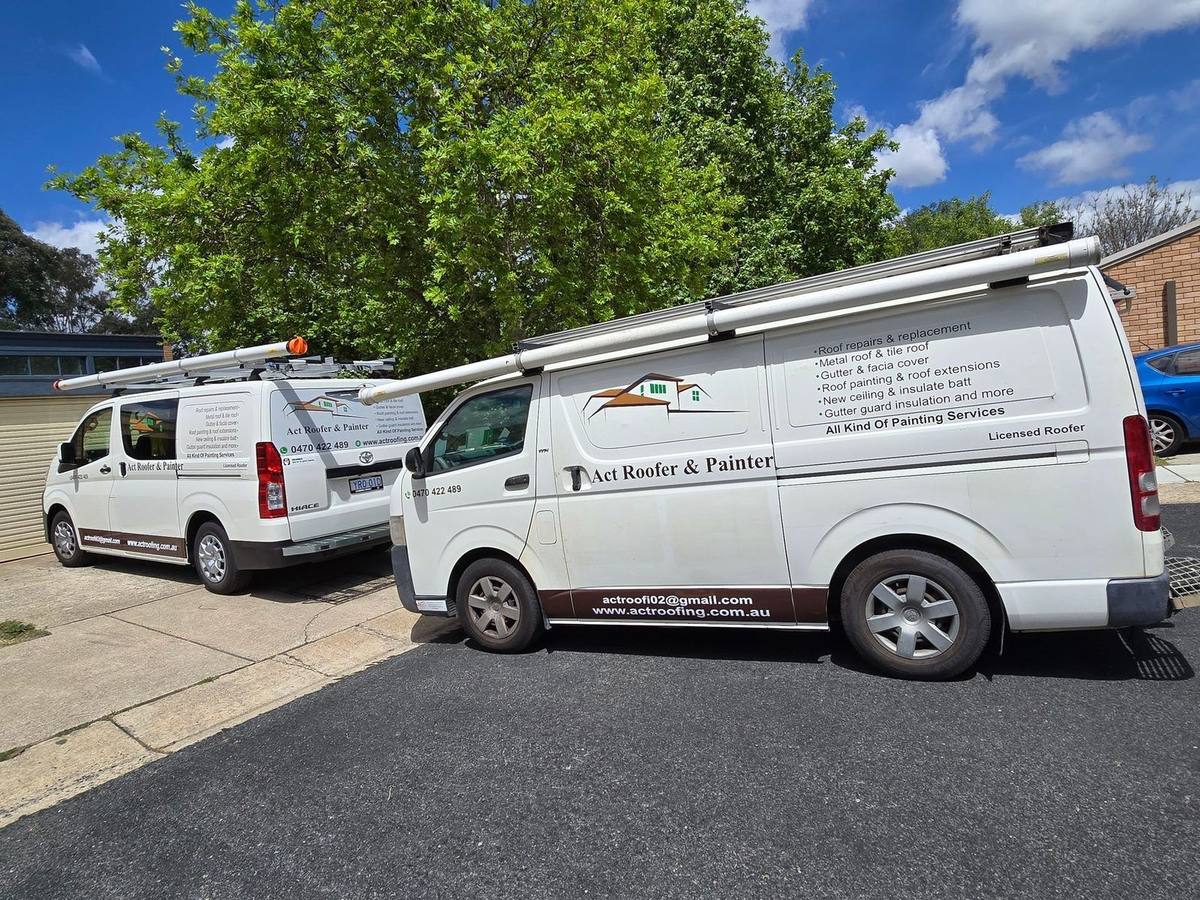 Act Roofer & Painter work vans on site